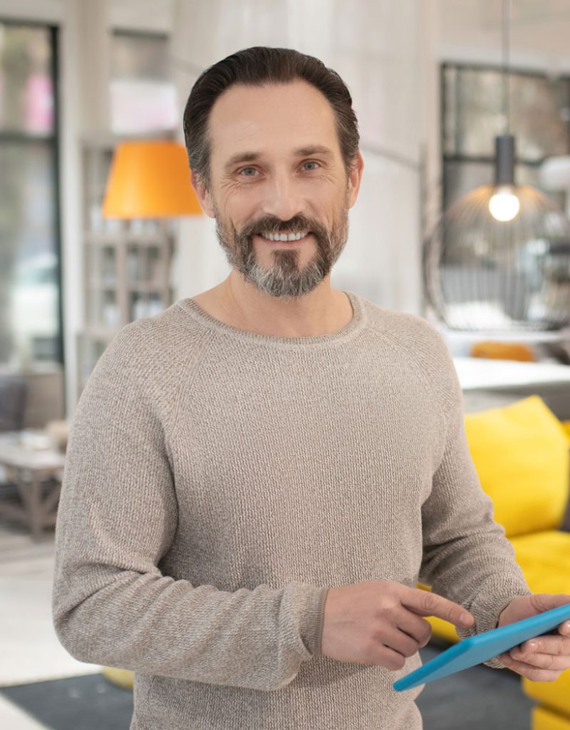 man-with-tablet-in-his-hands-feeling-good-M5SC4SH-1.jpg